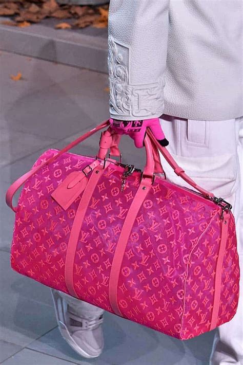 pink louis vuitton duffle bag.